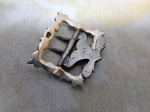 A small 18th century silver buckle. Maker IG.
