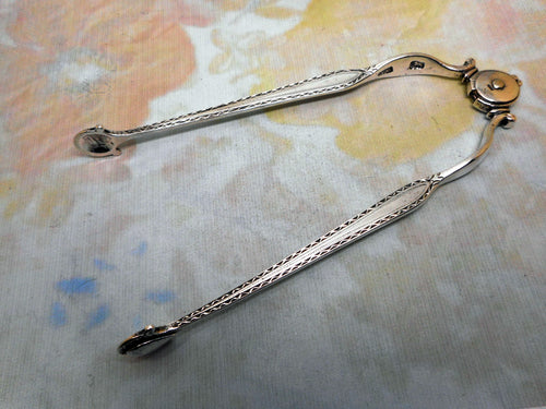 A rare pair of silver sugar tongs. c 1765-1780