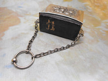 Load image into Gallery viewer, A silver prayer book holder with its prayer book. HM. 1903
