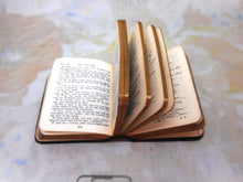 Load image into Gallery viewer, A silver prayer book holder with its prayer book. HM. 1903
