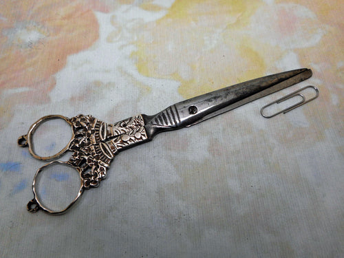 A large pair of Dutch silver mounted chatelaine scissors. 19thc