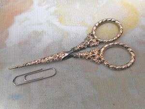 A pair of Georgian silver handled scissors and sheath. c1830