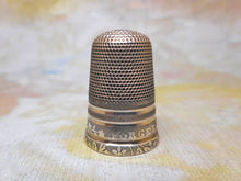 Load image into Gallery viewer, A silver thimble titled Forget Me Not. c1840
