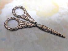 Load image into Gallery viewer, A pair of Regency silver handled scissors and sheath. c1825
