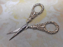 Load image into Gallery viewer, A pair of Regency silver handled scissors and sheath. c1825
