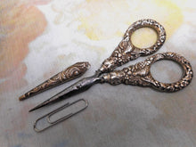 Load image into Gallery viewer, A pair of Regency silver handled scissors and sheath. c1825
