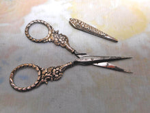 Load image into Gallery viewer, Georgian silver handled scissors and sheath. c1835
