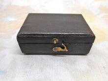 Load image into Gallery viewer, A cased sewing set -a silver tape measure, waxer and emery. c1850
