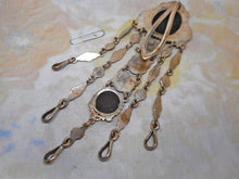 Load image into Gallery viewer, A white metal chatelaine with painted porcelain plaques. c1870 a/f

