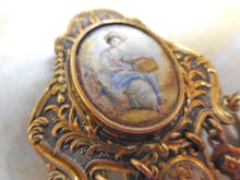 Load image into Gallery viewer, A white metal chatelaine with painted porcelain plaques. c1870 a/f
