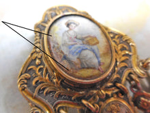 Load image into Gallery viewer, A white metal chatelaine with painted porcelain plaques. c1870 a/f
