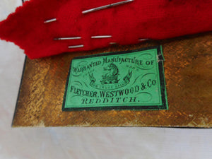 A leather case fitted with metal needle tubes. c1870