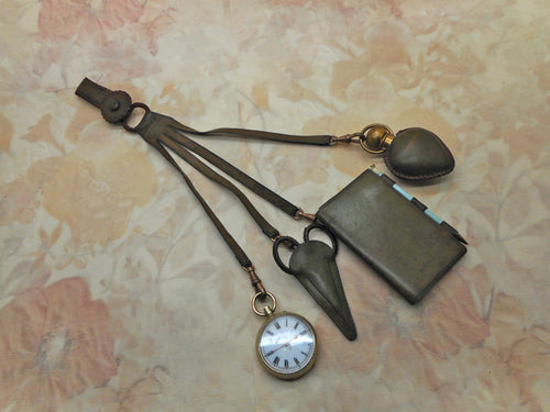 A nurse's chatelaine made using leather. c1900
