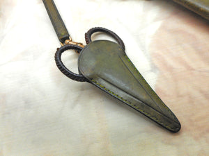 A nurse's chatelaine made using leather. c1900