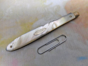 A steel bladed pocket knife with engraved silver spring cover. c1870