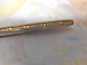 A steel bladed pocket knife with engraved silver spring cover. c1870