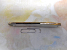 Load image into Gallery viewer, A steel bladed pocket knife with engraved silver spring cover. c1870

