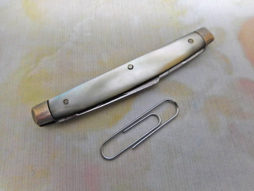 A double bladed pocket knife. T. W. Eaton