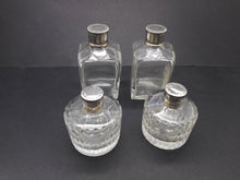 Load image into Gallery viewer, Reserved for G..........A set of four silver topped bottles. Palais Royal. pre-1809.
