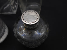 Load image into Gallery viewer, Reserved for G..........A set of four silver topped bottles. Palais Royal. pre-1809.
