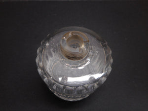 Reserved for G..........A set of four silver topped bottles. Palais Royal. pre-1809.