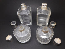 Load image into Gallery viewer, Reserved for G..........A set of four silver topped bottles. Palais Royal. pre-1809.
