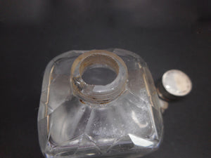 Reserved for G..........A set of four silver topped bottles. Palais Royal. pre-1809.