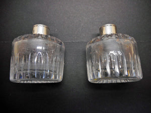 Reserved for G..........A set of four silver topped bottles. Palais Royal. pre-1809.