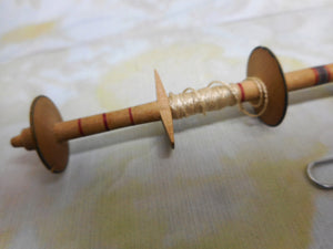 A Painted Tunbridge Ware reel from a sewing box. c 1800