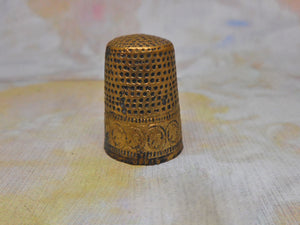 A late medieval, gilt brass thimble. Nuremberg c1580
