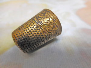 A late medieval, gilt brass thimble. Nuremberg c1580