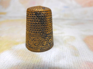A late medieval, gilt brass thimble. Nuremberg c1580