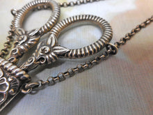 Load image into Gallery viewer, A silver scissor case and scissors from a chatelaine. GU. B&#39;1897.
