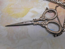Load image into Gallery viewer, A silver scissor case and scissors from a chatelaine. GU. B&#39;1897.
