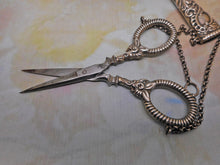 Load image into Gallery viewer, A silver scissor case and scissors from a chatelaine. GU. B&#39;1897.
