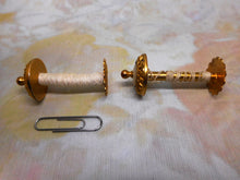 Load image into Gallery viewer, A pair of decorative gilt metal reels / spools. c1880

