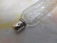 Load image into Gallery viewer, A long, glass scent bottle with a silver cap. c1820. English.
