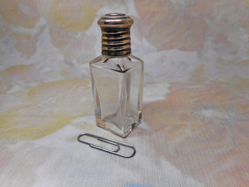A glass scent bottle from a sewing set. c 1870