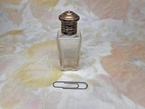 A glass perfume bottle from an 1870s standing etui. Continental.