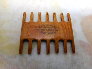 A Mauchline Ware comb shaped thread winder. Abbotsford. c1870