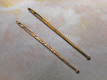 Load image into Gallery viewer, Two decorative gilt metal bodkins. c 1900
