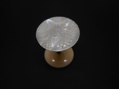 An engraved mother of pearl reel / spool. c1840