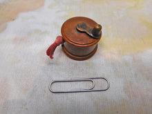 Load image into Gallery viewer, A small wooden tape measure. c1900
