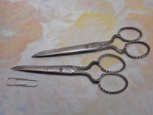 Load image into Gallery viewer, Two pairs of J. Rodgers &amp; Sons steel scissors. c1850
