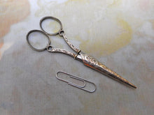 Load image into Gallery viewer, A pair of bright cut, engraved silver scissors with sheath. c1820.
