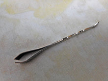 Load image into Gallery viewer, An engraved silver ear spoon / tweezer combo. c1840.
