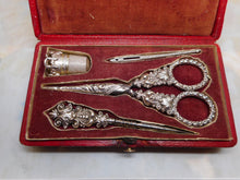 Load image into Gallery viewer, A red leather etui with sewing tools. c1830
