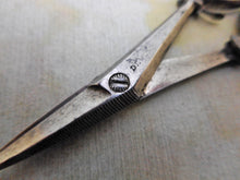 Load image into Gallery viewer, A pair of rare folding steel chatelaine scissors. c1840
