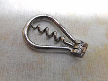 Load image into Gallery viewer, A miniature folding steel corkscrew. c1840
