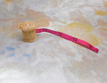 Load image into Gallery viewer, A pearl topped tape measure. c 1850
